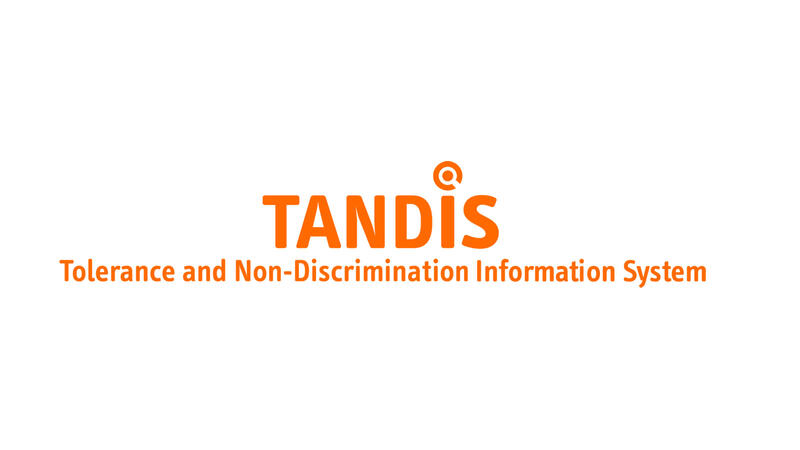 TANDIS logo with "Tolerance and Non-Discrimination Information System" text in orange.